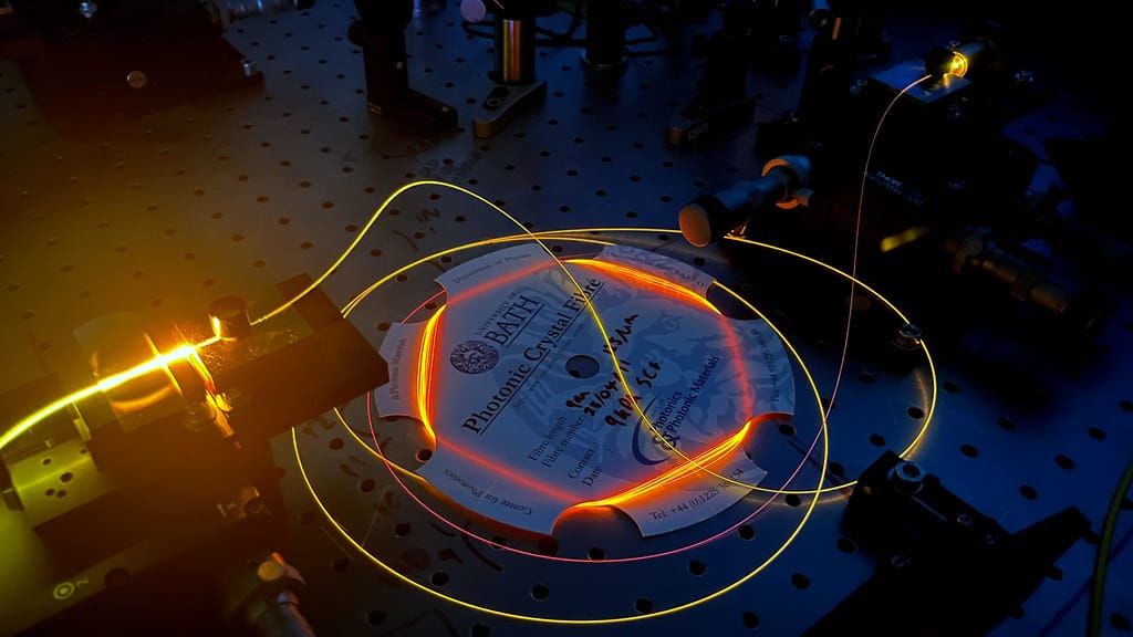 Bright light guided through an optical fibre manufactured at the University of Bath. Credit: Cameron McGarry