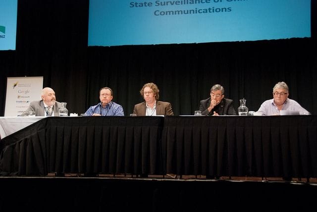 Convener Laurence Millar and the panel discussing state surveillance at NetHui 2013. From left to right: Laurence Miller, Dr. Paul Buchanan, Ian Apperley, Sir Bruce Ferguson and Michael Wigley.