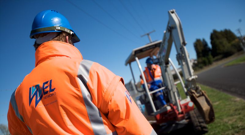 Waikato Networks engineer with digger.