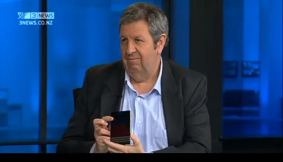 Bill Bennett showing the BlackBerry Passport on TV3.